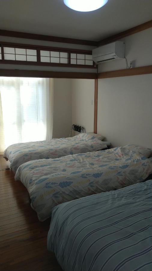 Kami House Otel Amami Oda fotoğraf